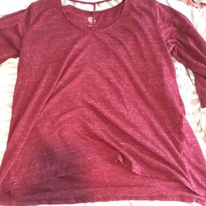 A maroon half sleeve shirt